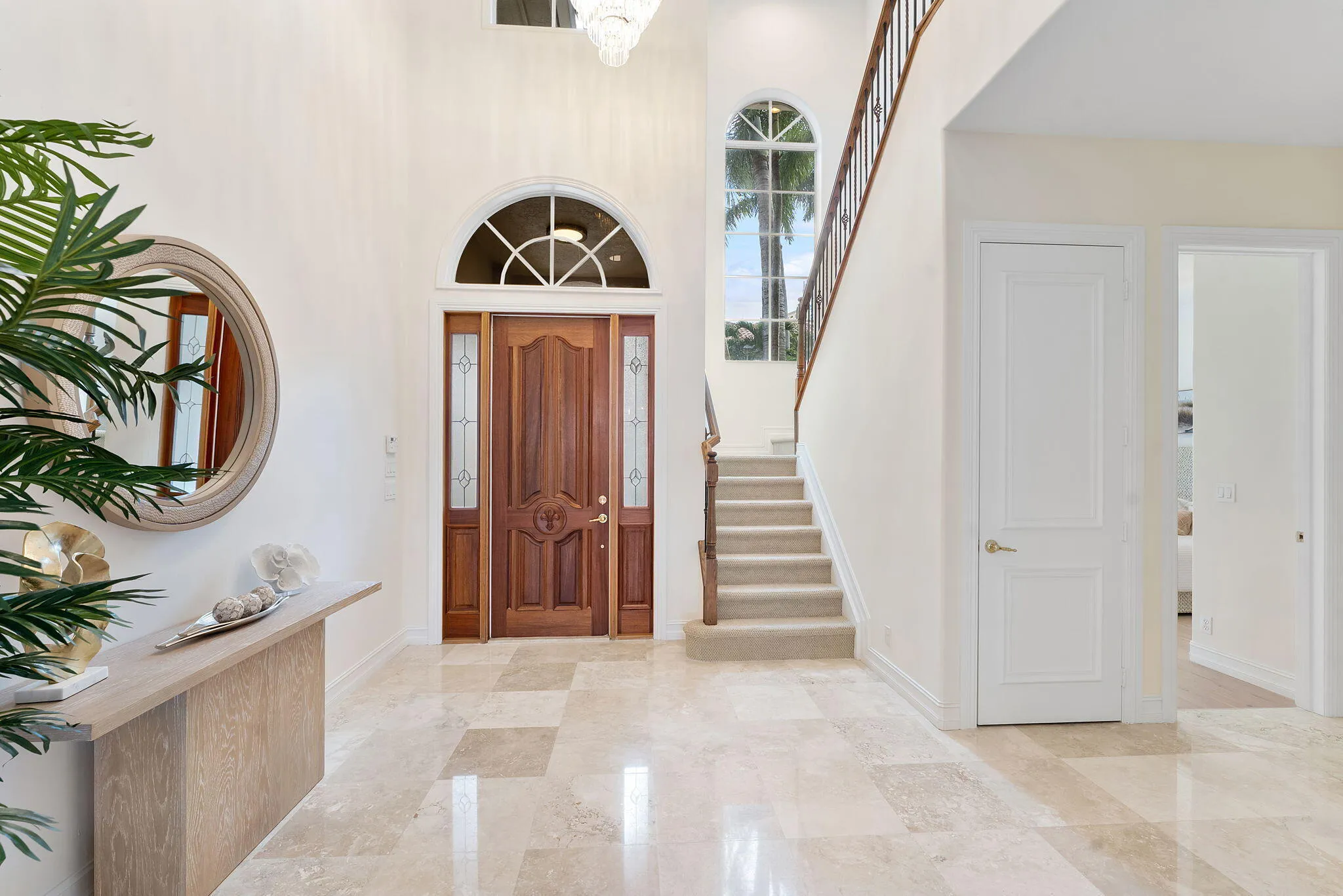 Entryway + Staricase + Large Storage Closet.