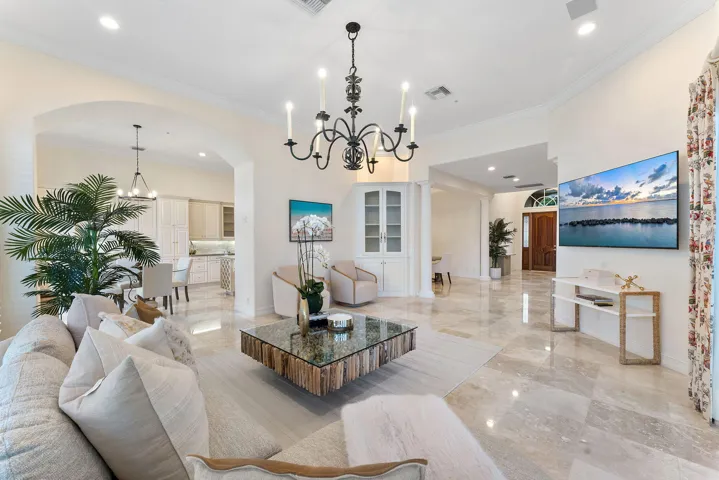 Living room flows seemlessly into the bar, the dining room and the kitchen.
