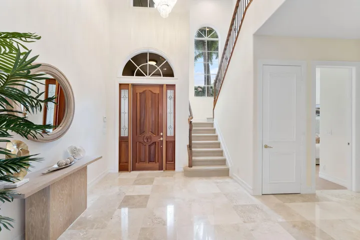 Entryway + Staricase + Large Storage Closet.