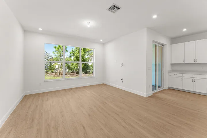 Stock photos represent builder's floorplan