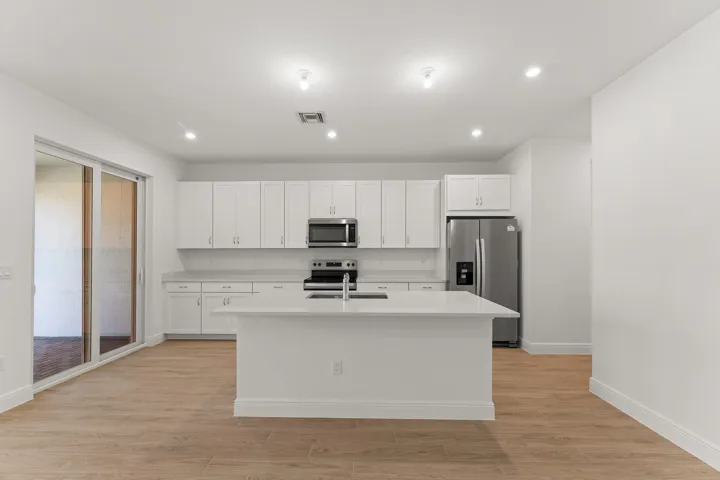 Stock photos represent builder's floorplan