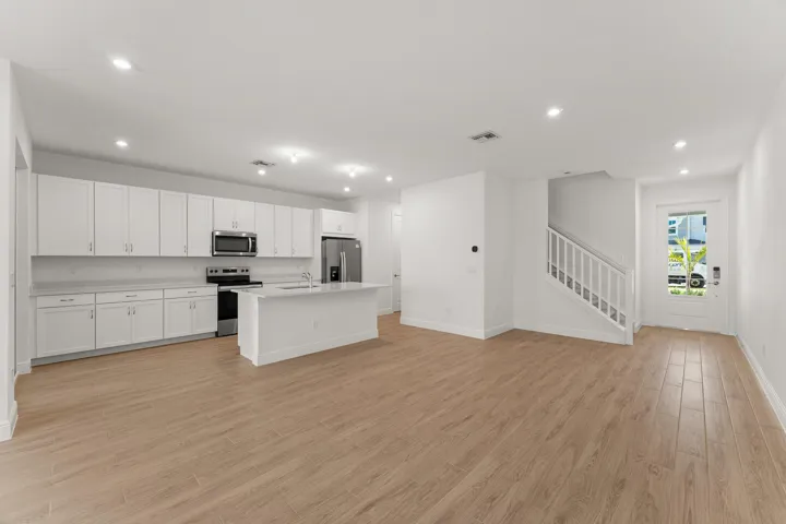 Stock photos represent builder's floorplan