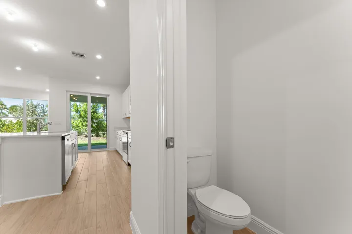 Stock photos represent builder's floorplan