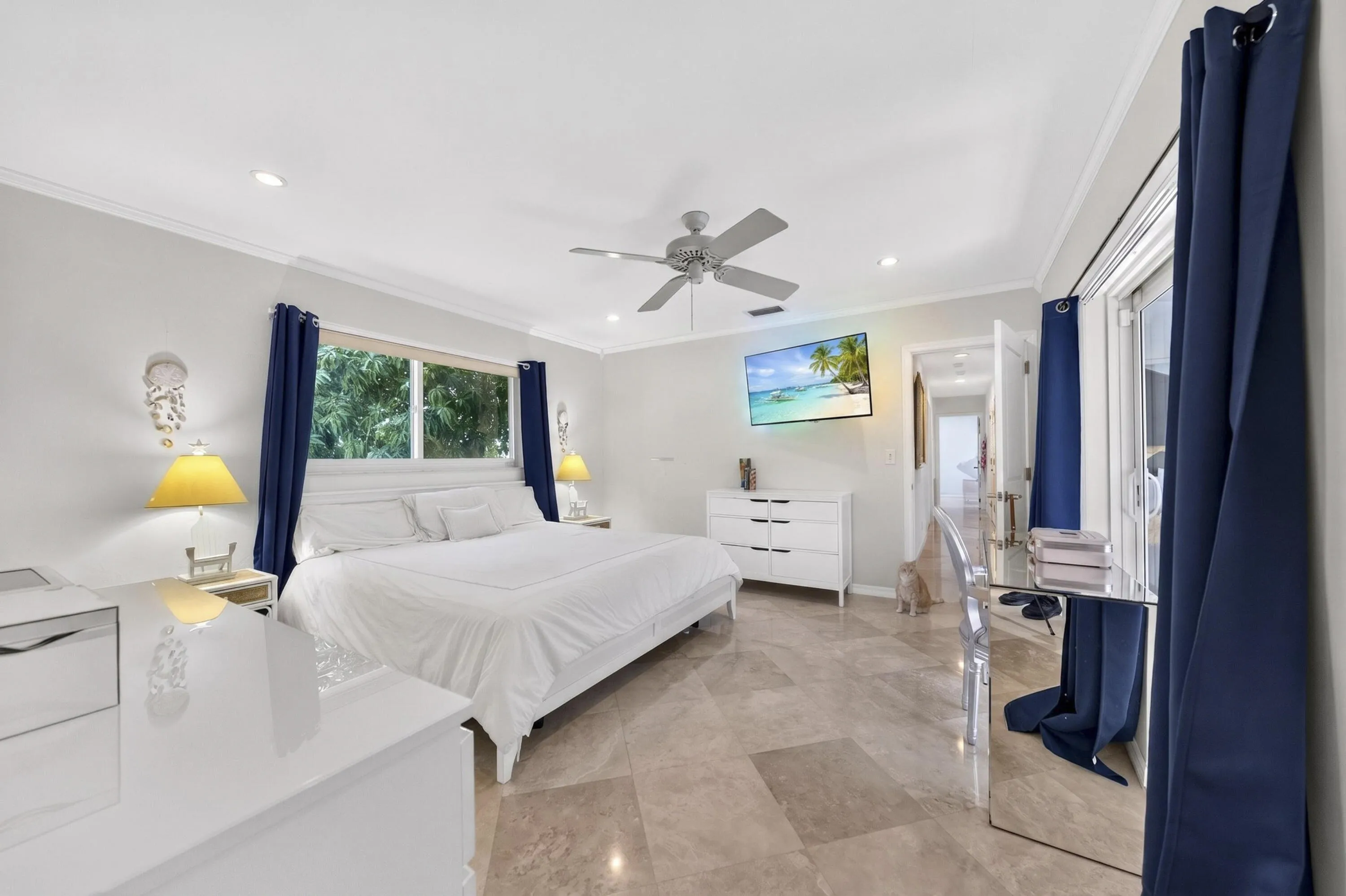 Spacious MBR featuring marble flooring, a large window, recessed lighting, and a ceiling fan