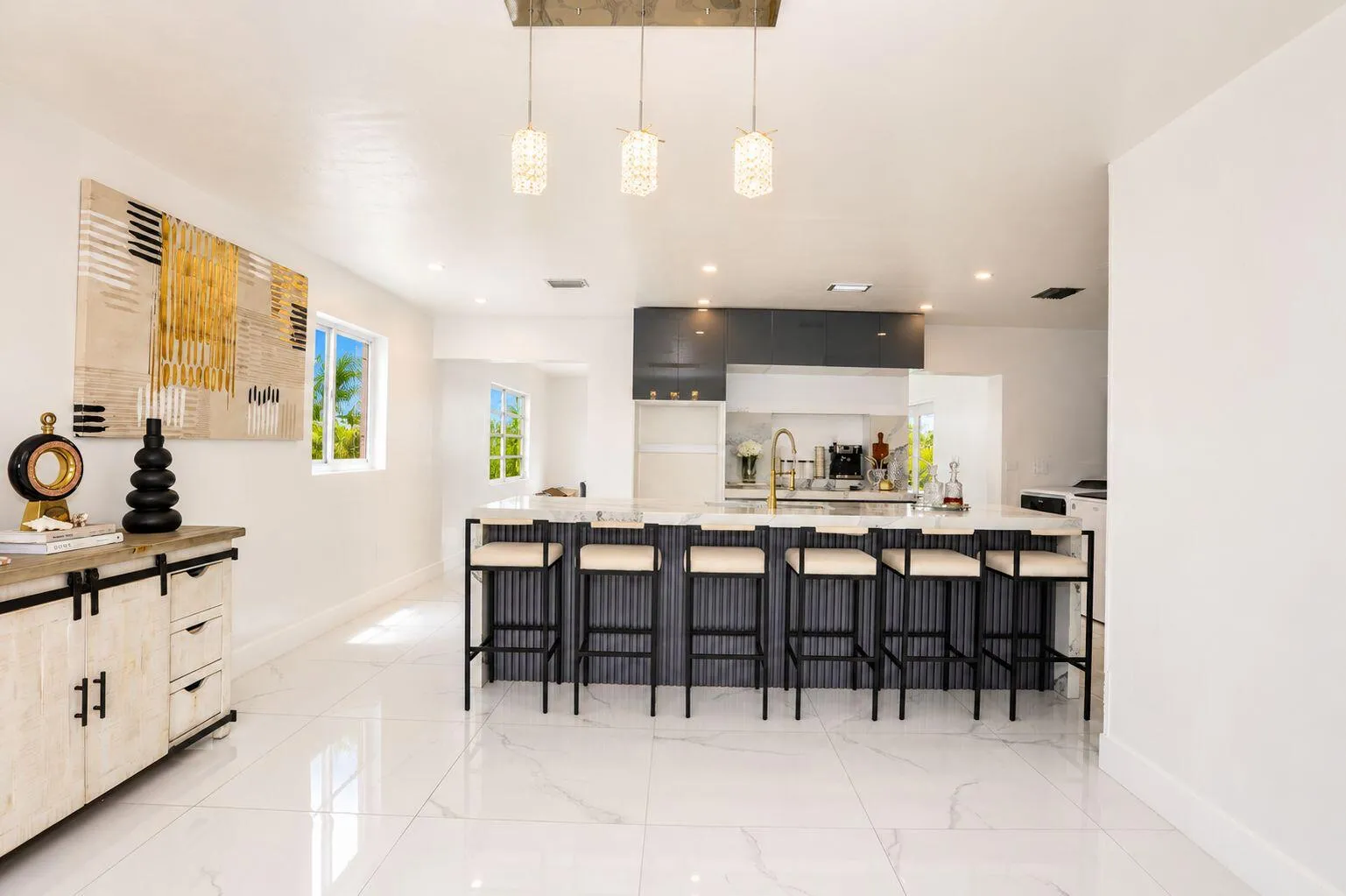 Spacious kitchen with ample cabinetry and generous counter space. Bright kitchen featuring abundant storage and functional layout. Well-appointed kitchen designed for everyday living and entertaining.