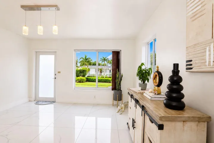 Elegant marble-floored foyer welcomes you into the home.