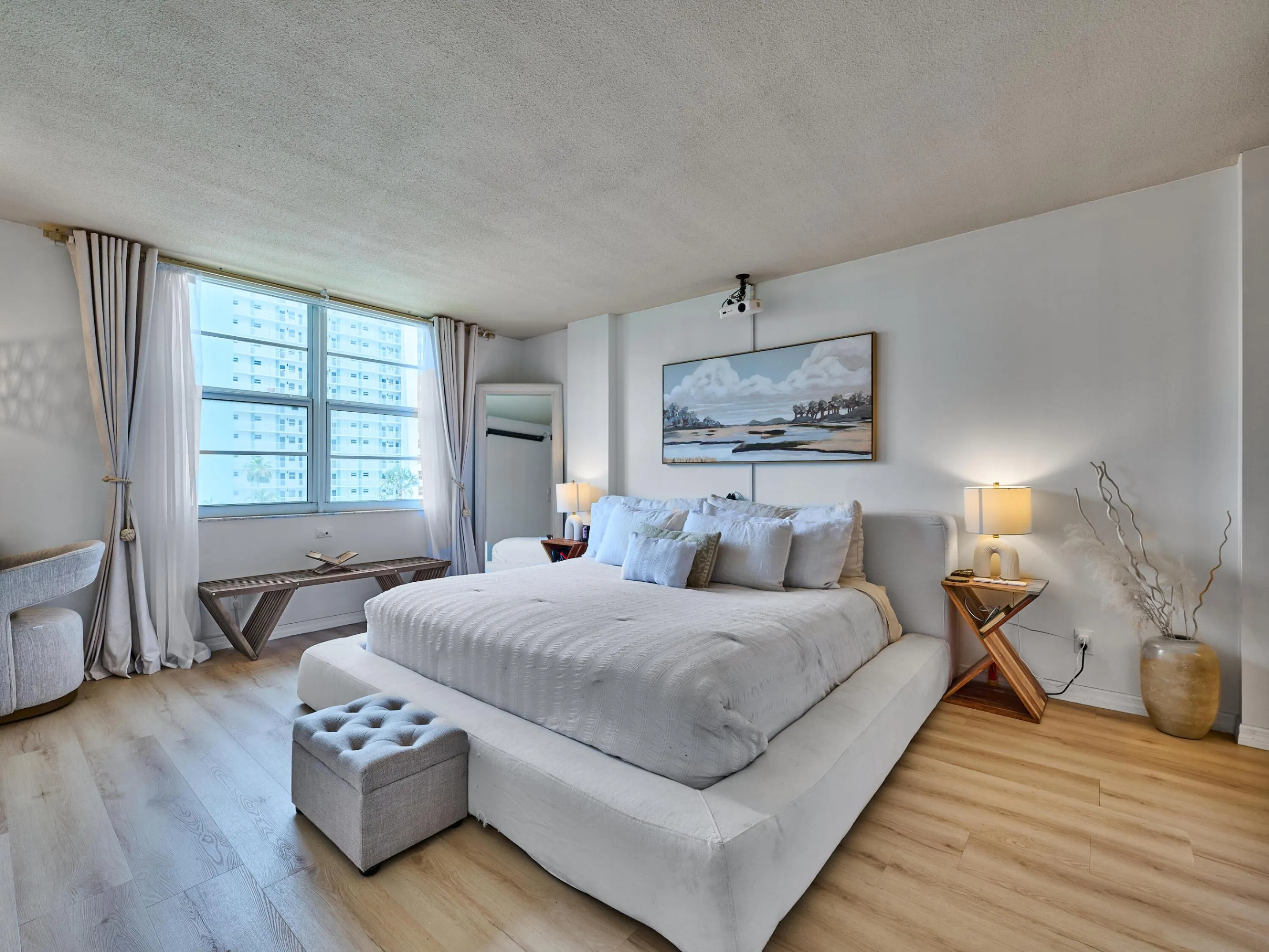 Primary Bedroom | Spacious retreat with abundant natural light.