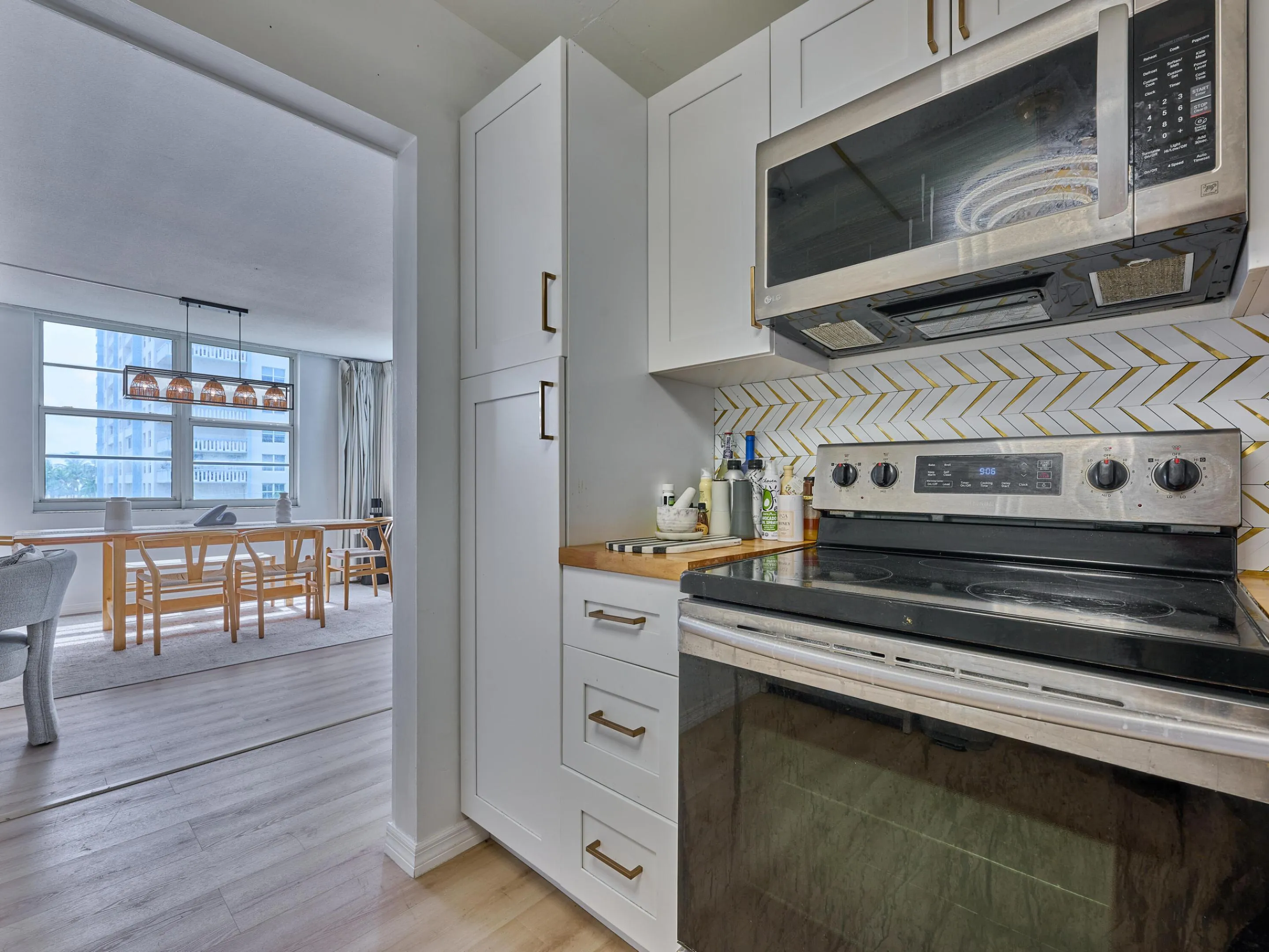 Kitchen | Updated with stainless steel appliances and modern finishes.