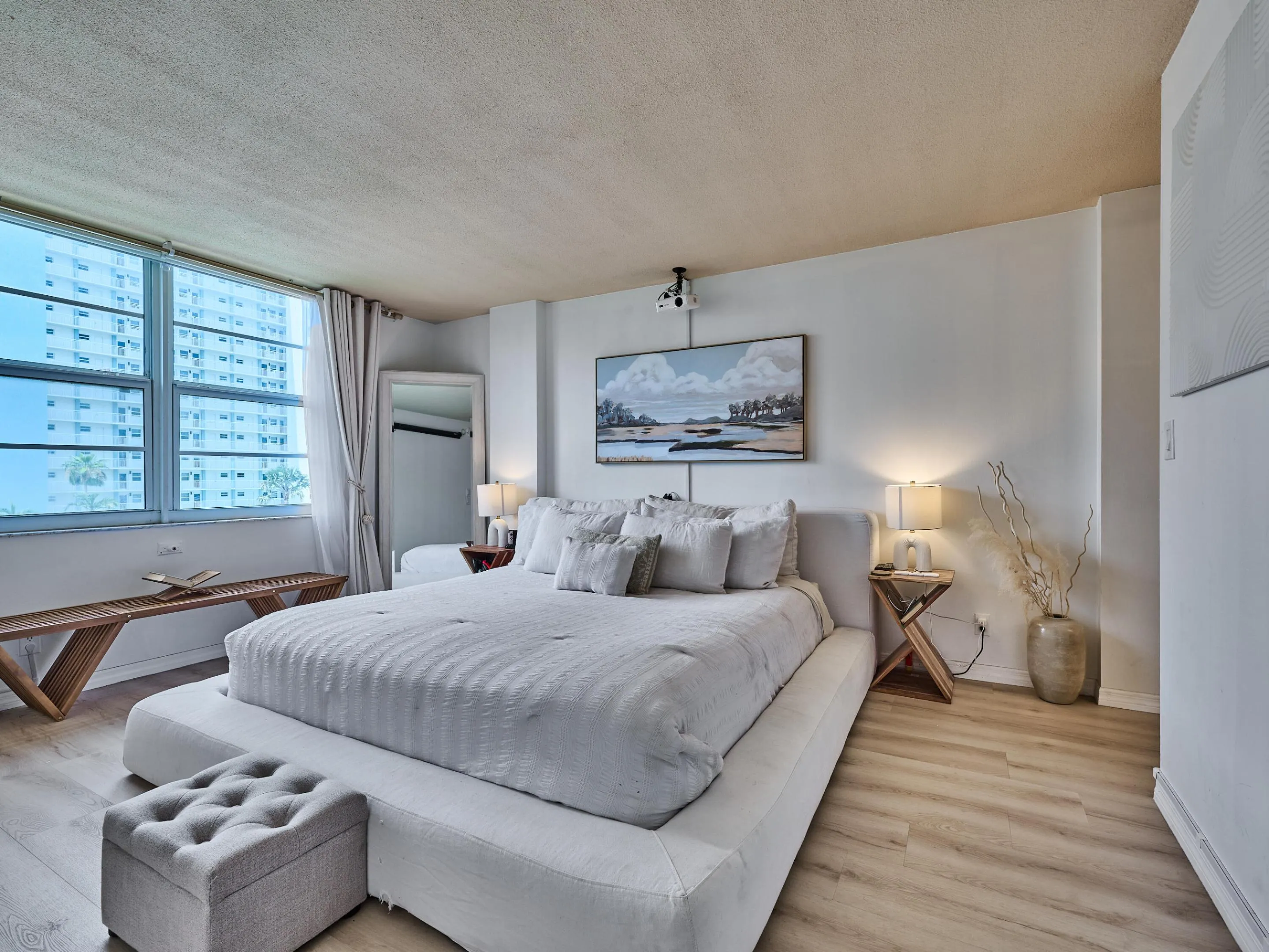 Primary Bedroom | Spacious retreat with abundant natural light.