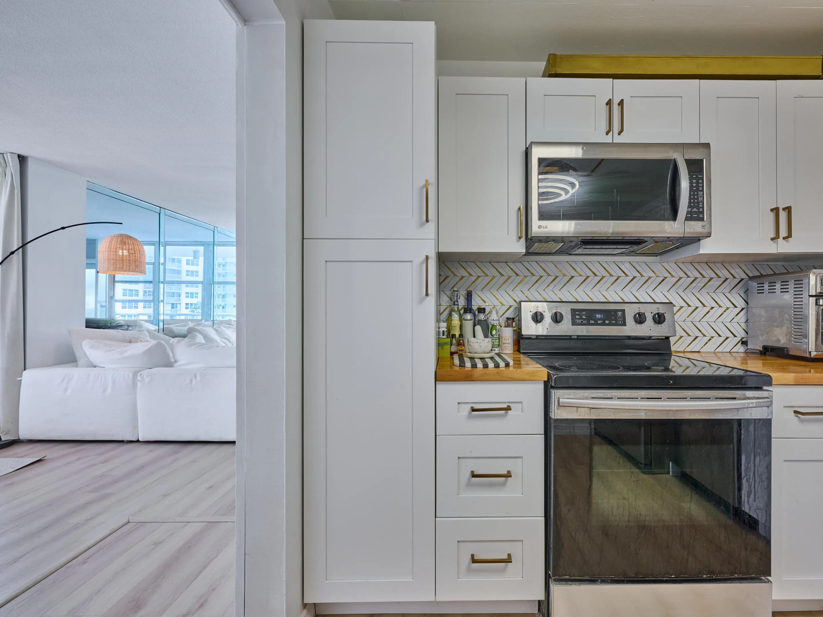 Kitchen | Updated with stainless steel appliances and modern finishes.