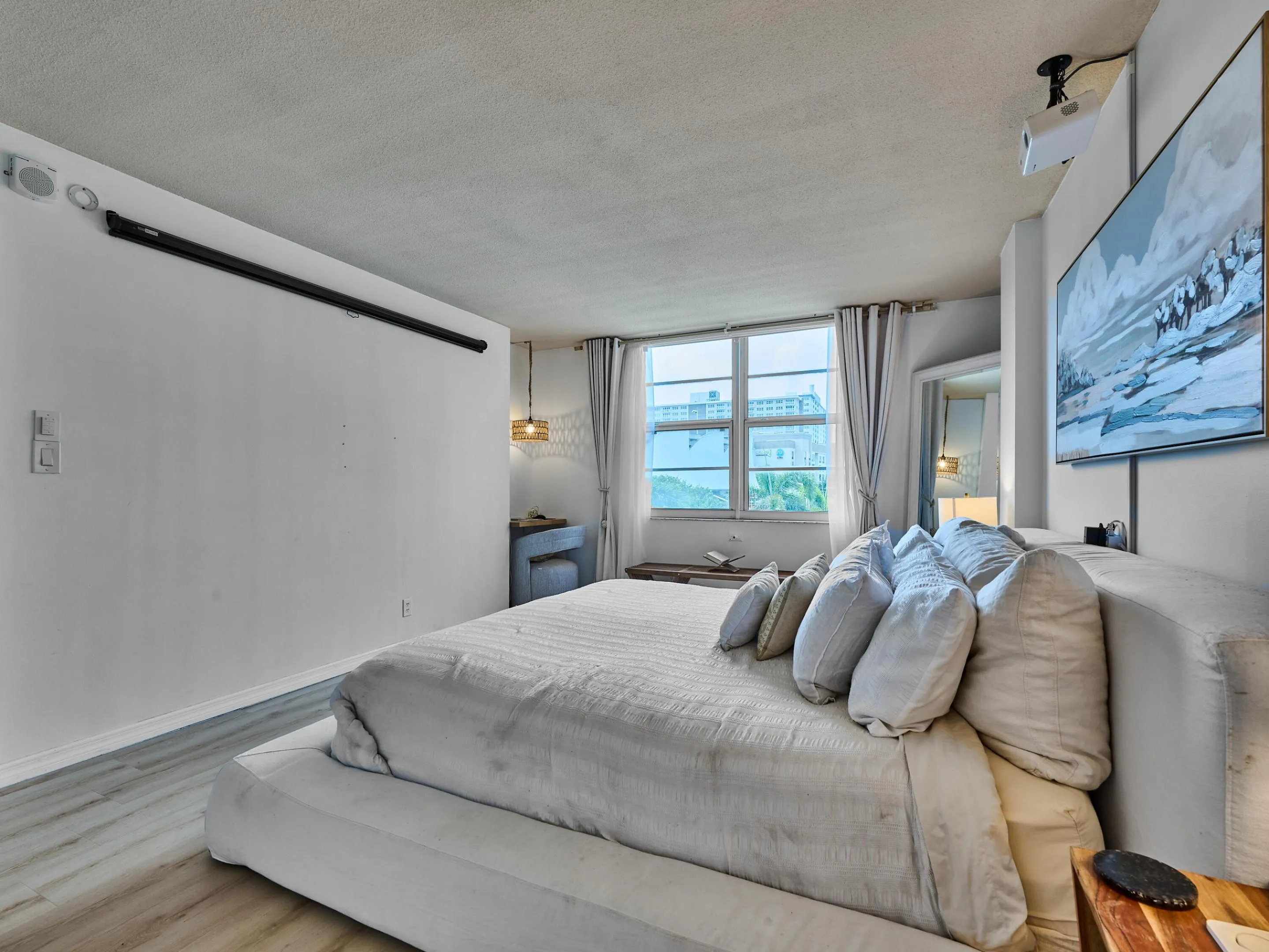 Primary Bedroom | Spacious retreat with abundant natural light.