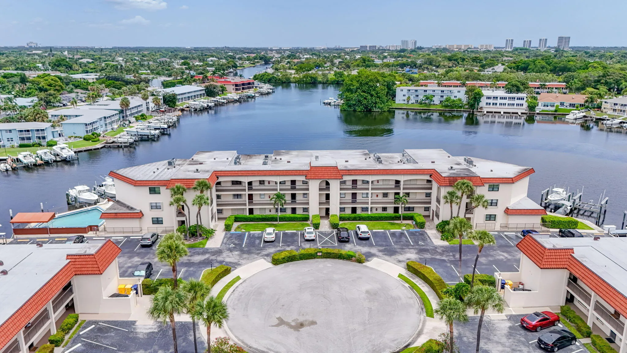 Waterfront multi-story residential building with private boat slips