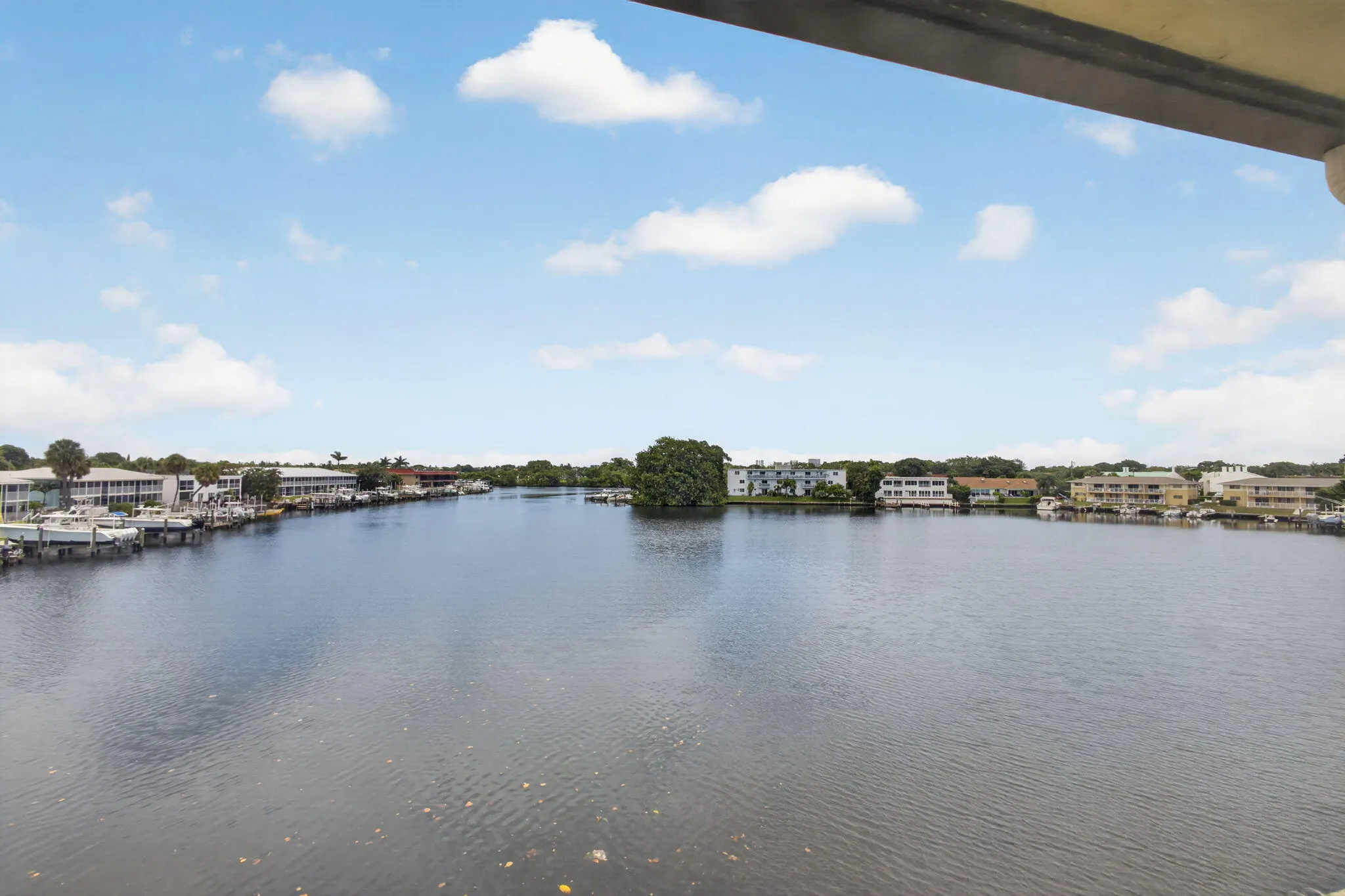 Expansive waterfront setting with wide canal access