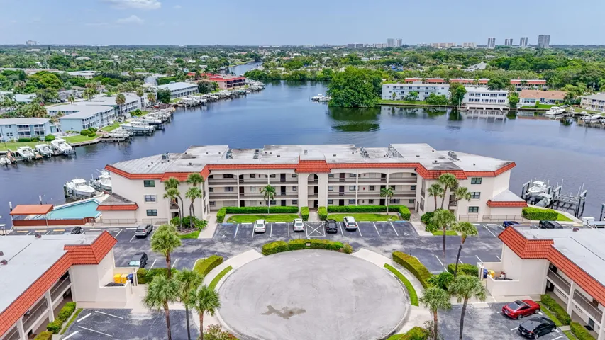 Waterfront multi-story residential building with private boat slips