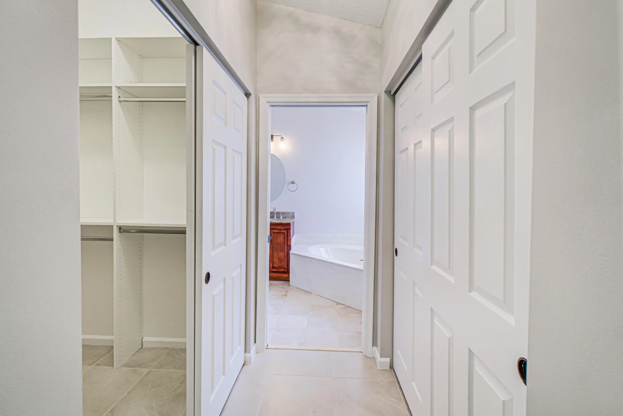 Walk-in closet and an additional reach in closet
