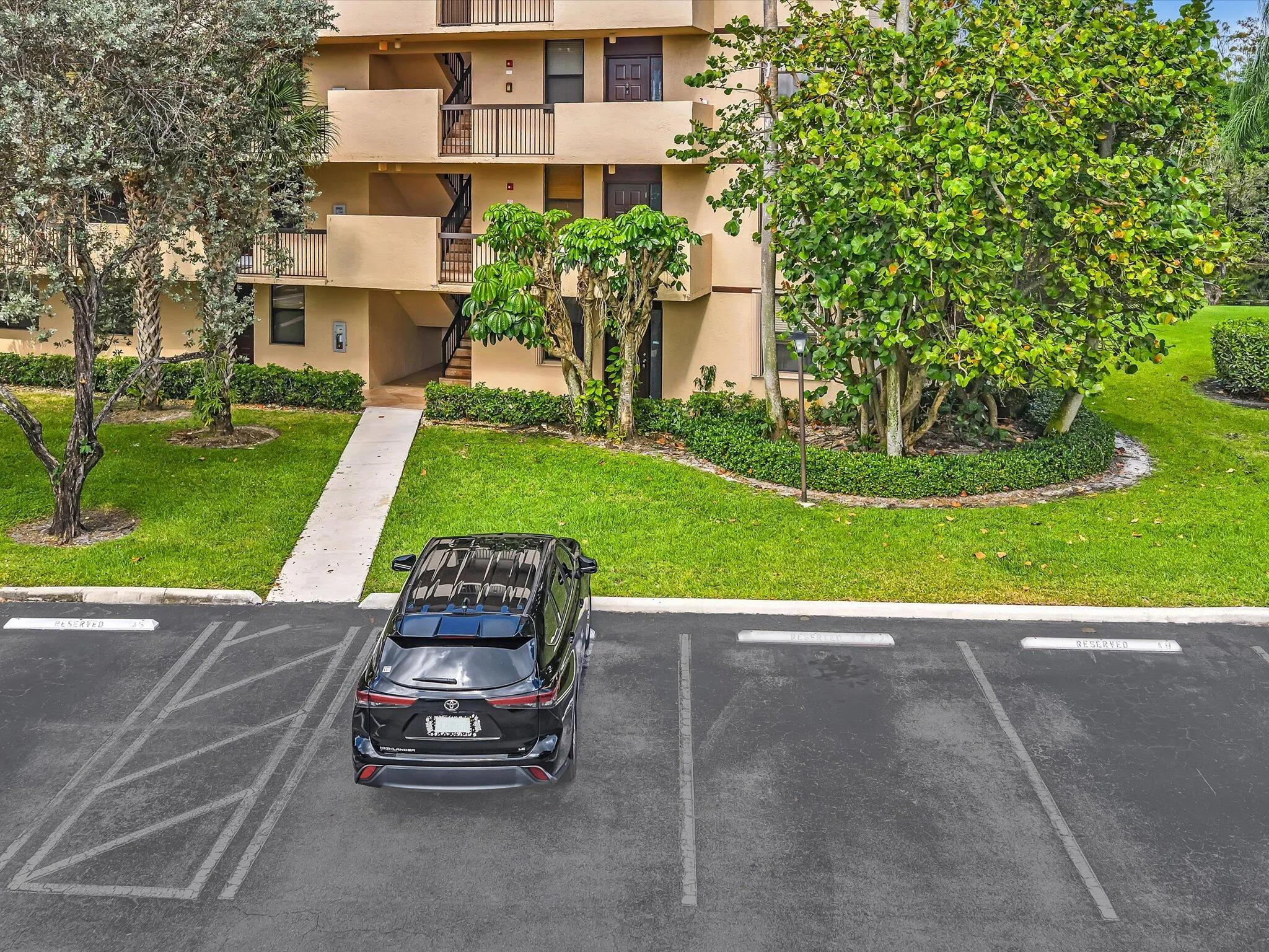 This is the unit's parking space, right in front of it.