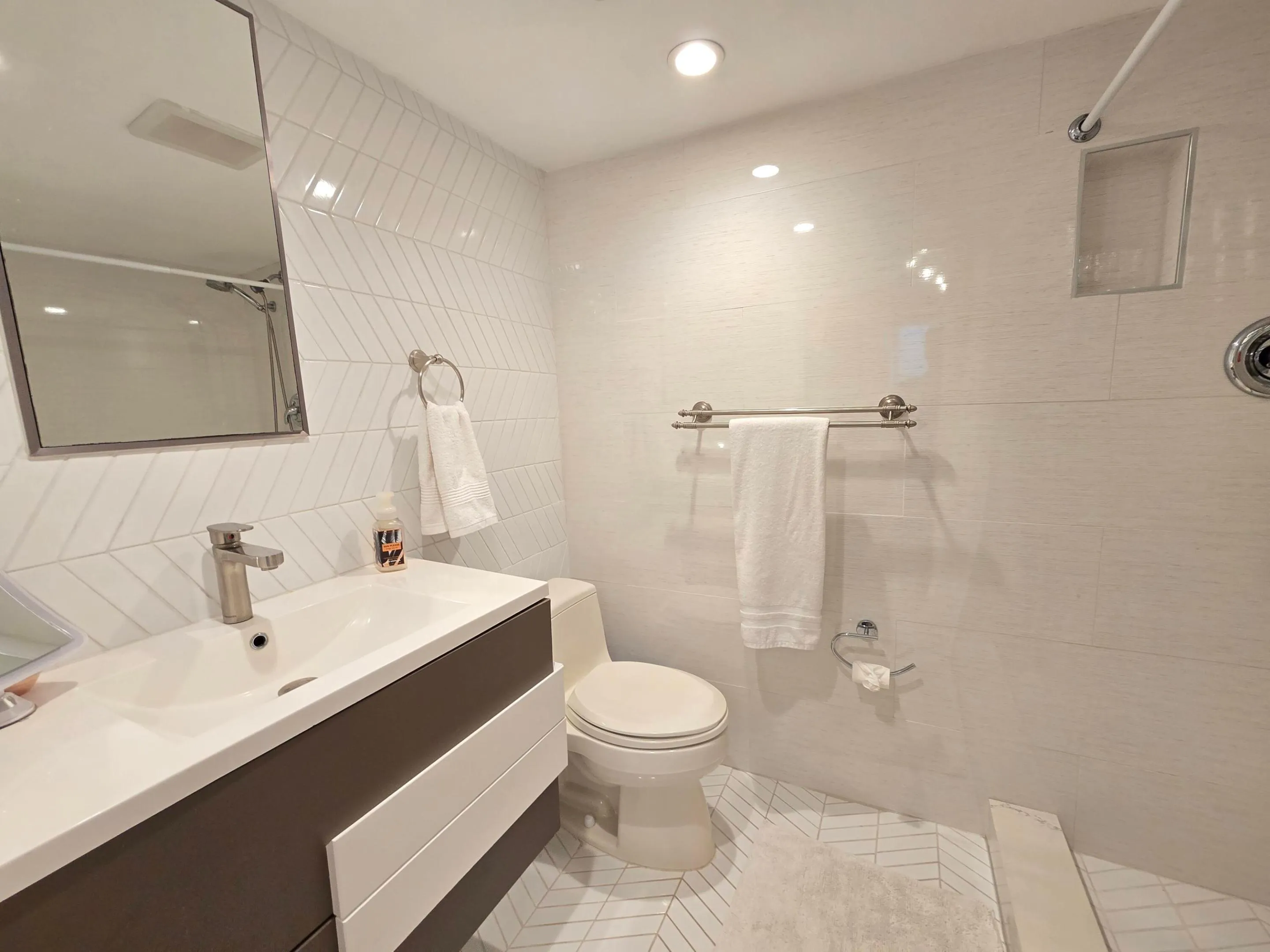 Main Bathroom with chevron tiles and shower