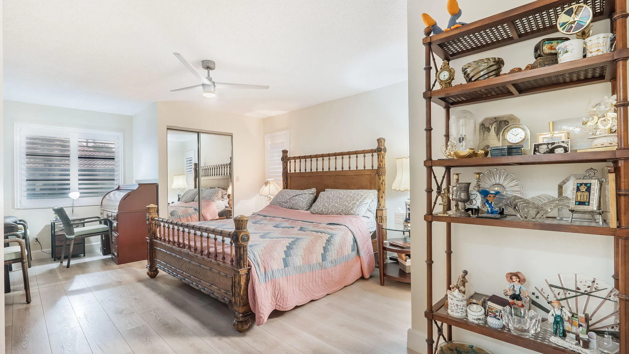 Light wood-finish flooring complements the neutral wall tones