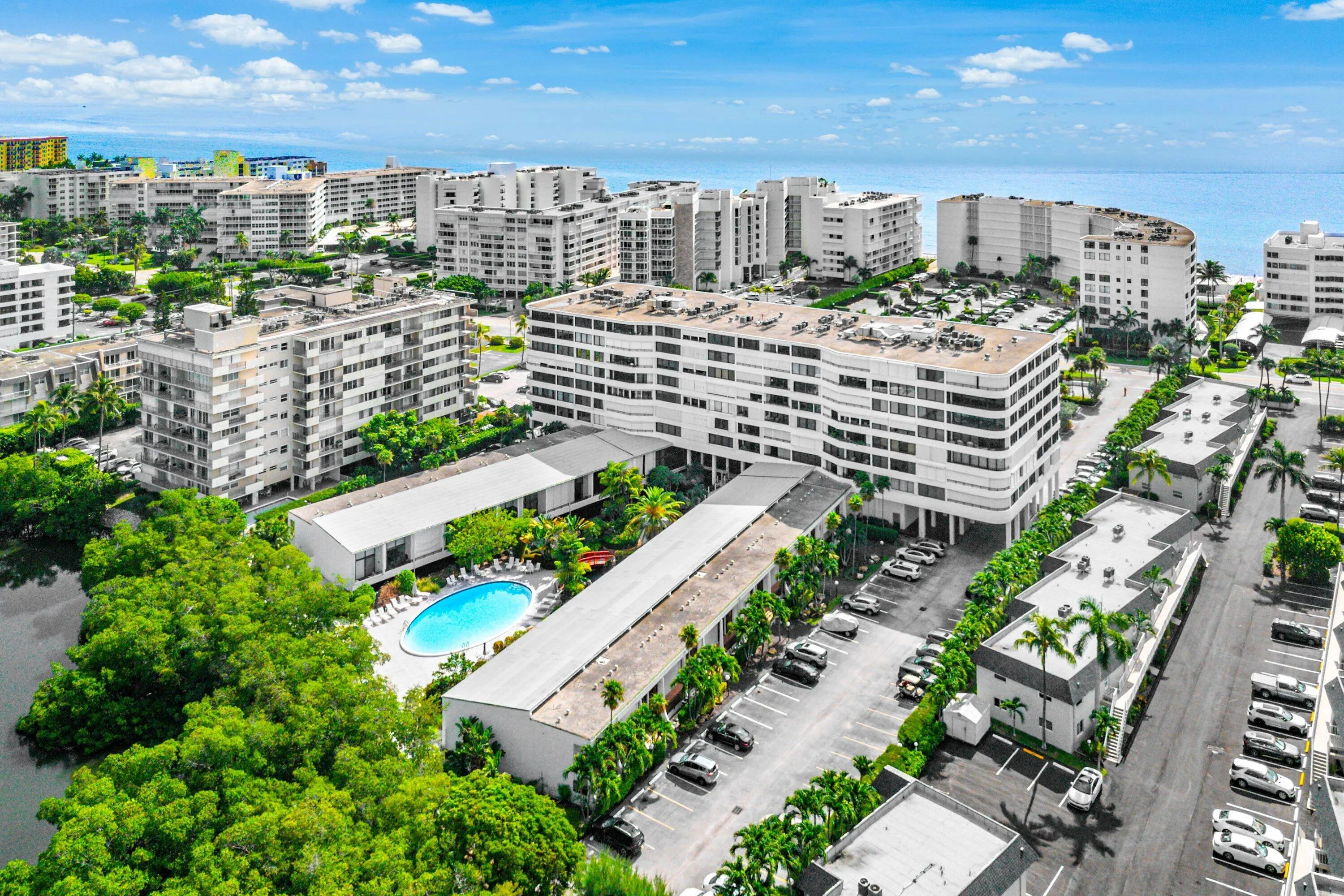 Coastal urban setting featuring multiple low-rise and mid-rise buildings
