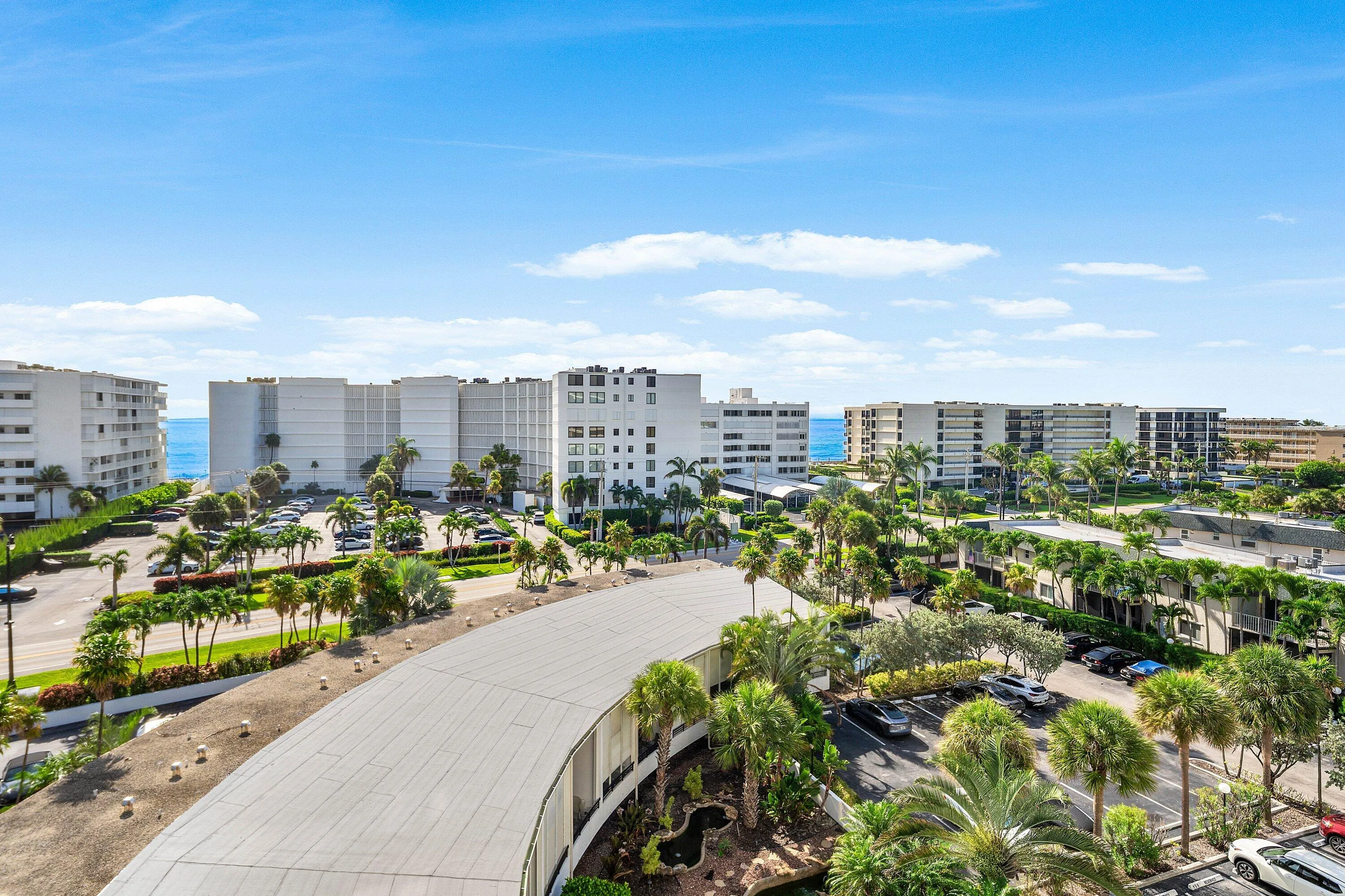 Expansive coastal scenery featuring multiple residential buildings and ocean frontage