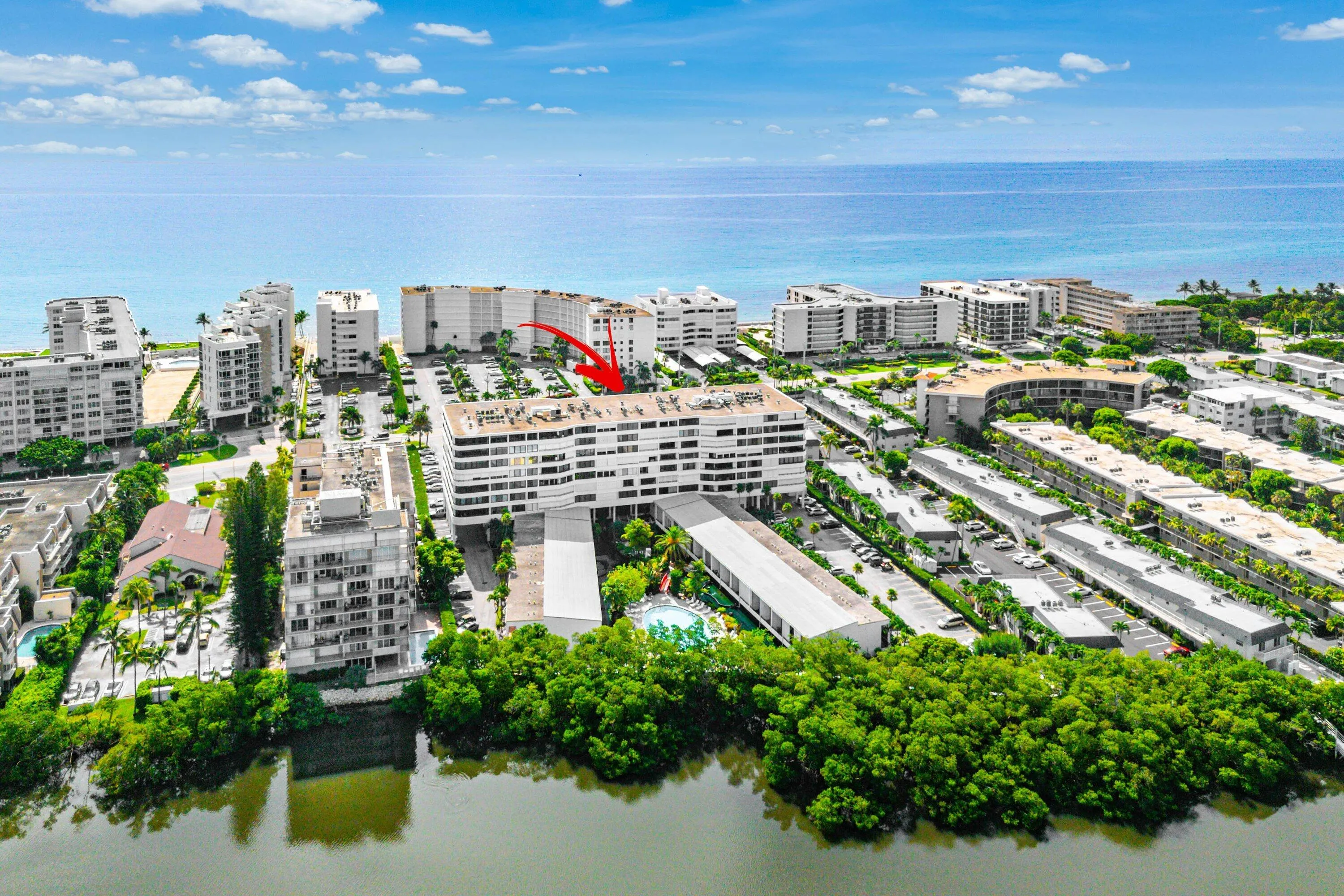 Waterfront multi-story building with a flat roof