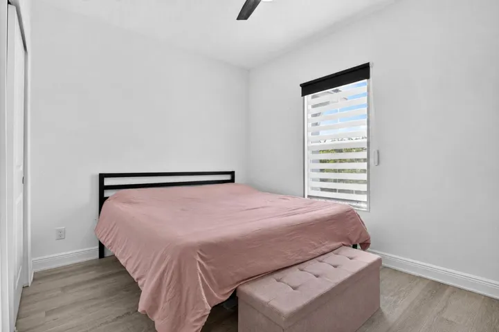 Bright interior space featuring wood-finish flooring