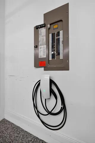 Dedicated EV charging station on a painted wall