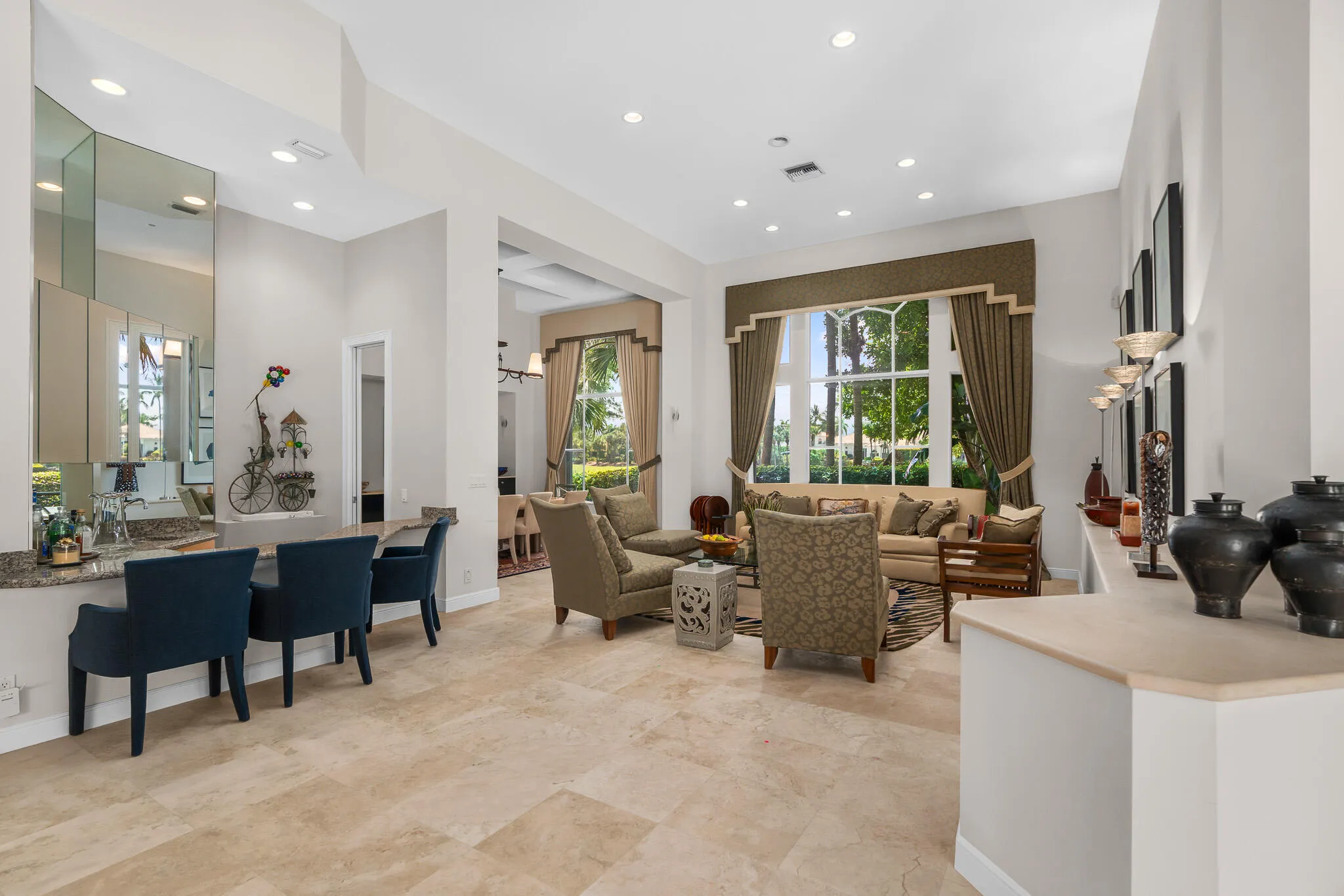 living room with bar and dining room
