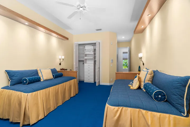 guest bedroom with 2 beds