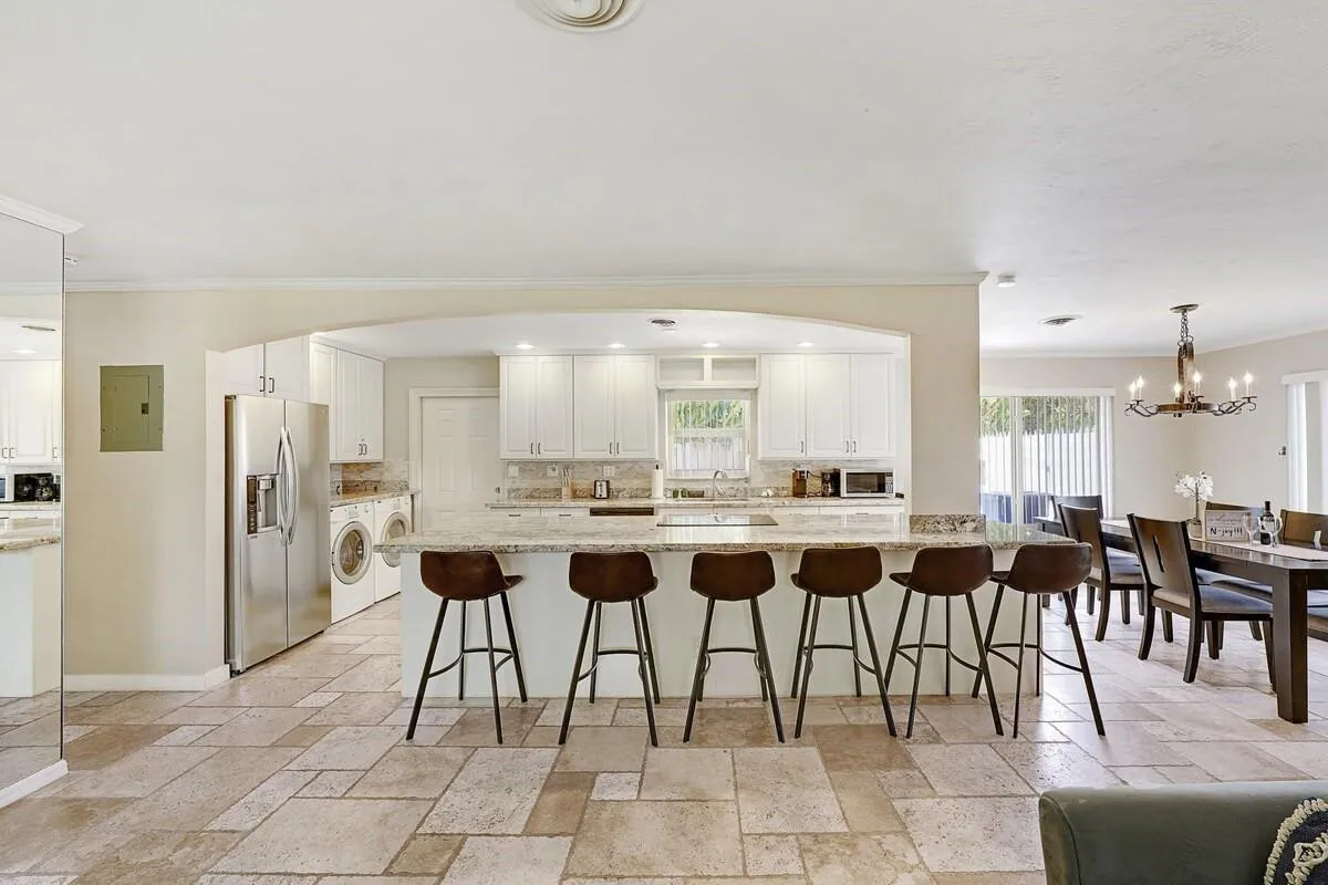 Kitchen with open lay out. Island fits 8 sits.
