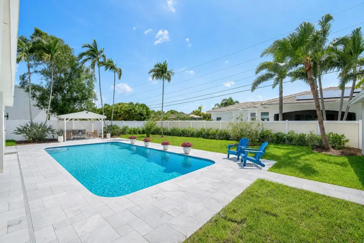 Sparkling Blue Pool w/ Travertine deck