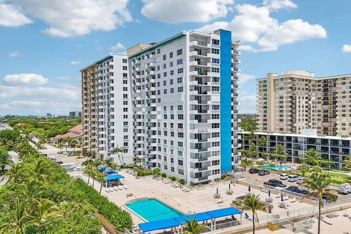Building exterior getting painted with a modern coastal color scheme!