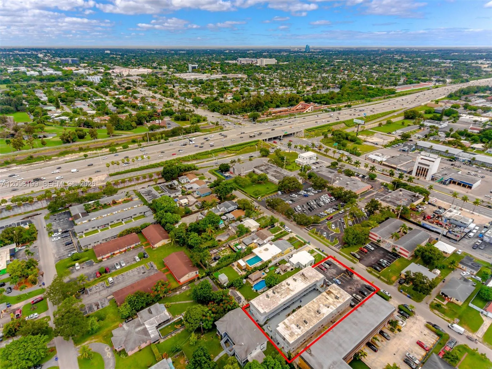 Aerial shows close proximity to the highway that also leads you to 595. YOu can see the tri-rail stop. Close access to public transportation. The parking lot has since been repaved. This photo was taken 3 years ago.