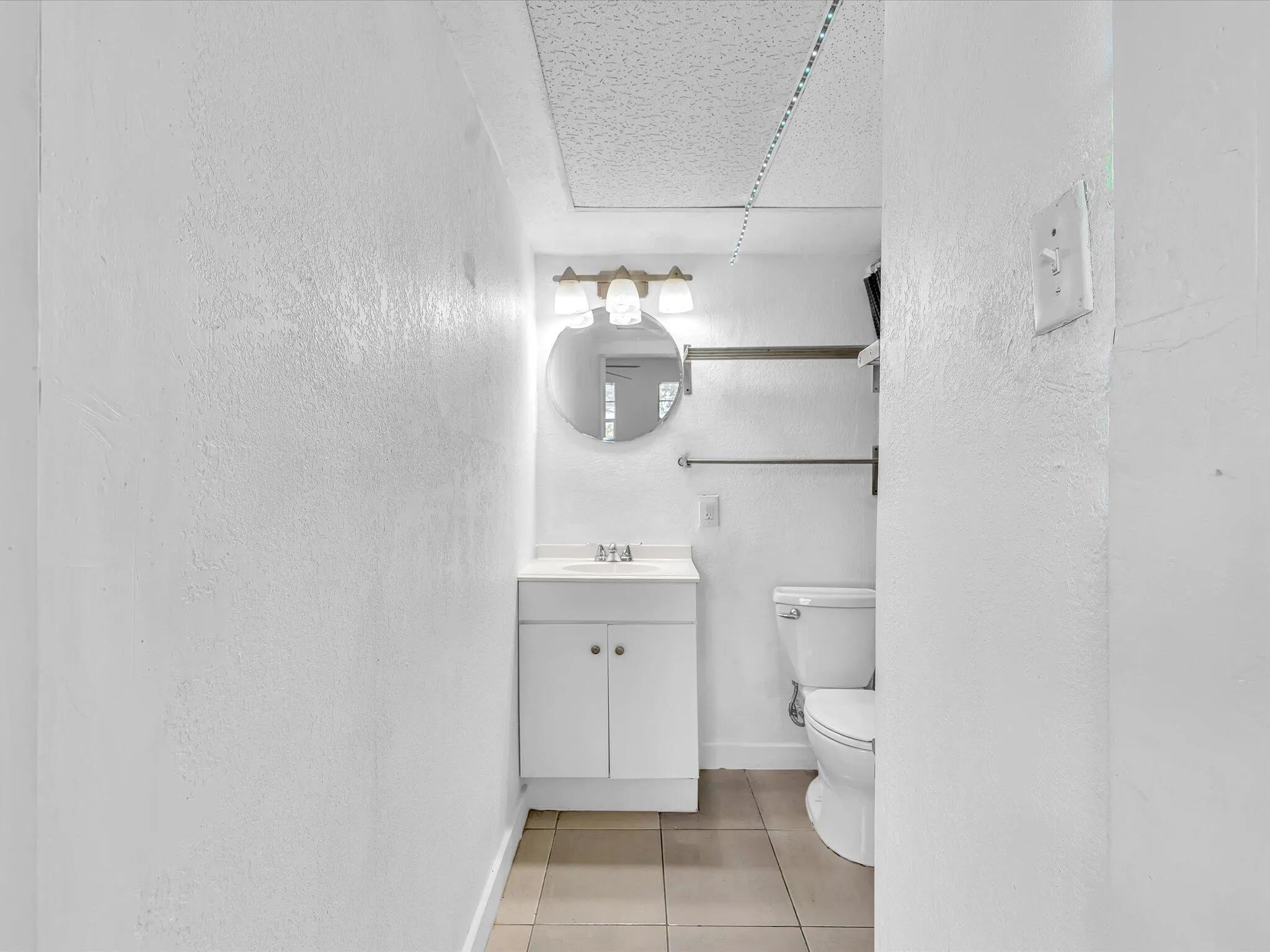 Spacious attached studio wing featuring a private entrance, closet, and full en-suite bath.