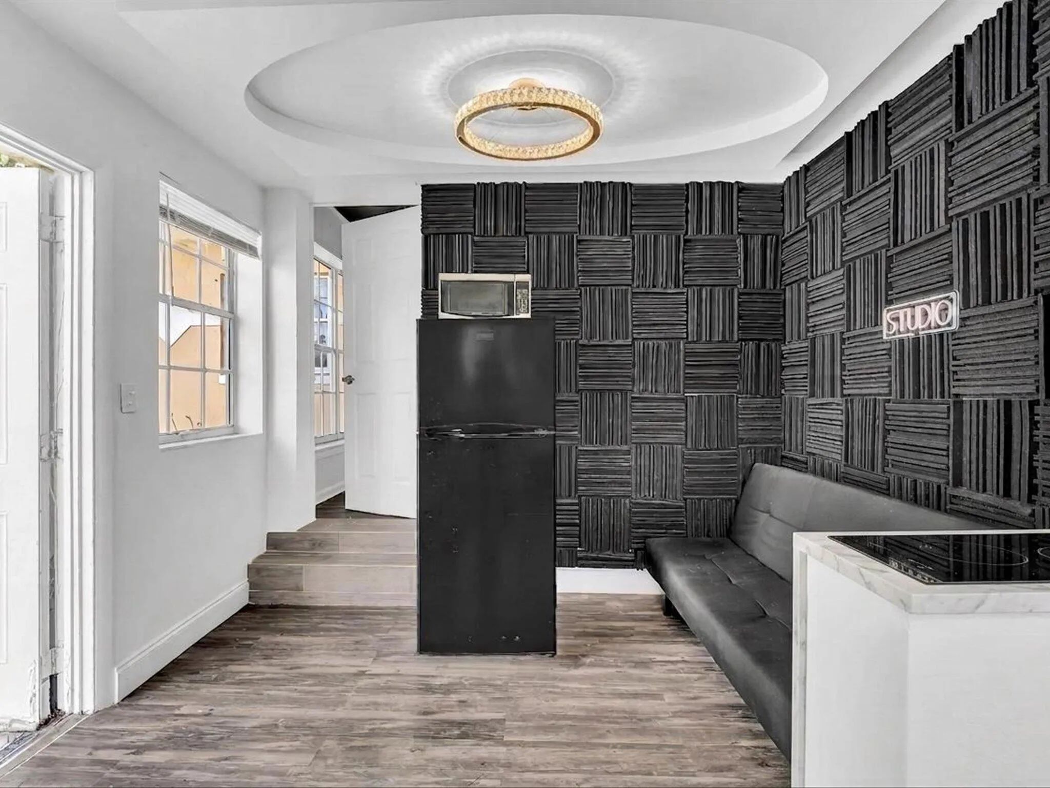 This area has plumbing and electrical that can be converted to a kitchenette