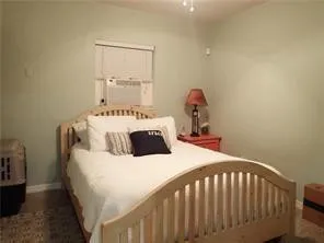 Furnished primary bedroom example