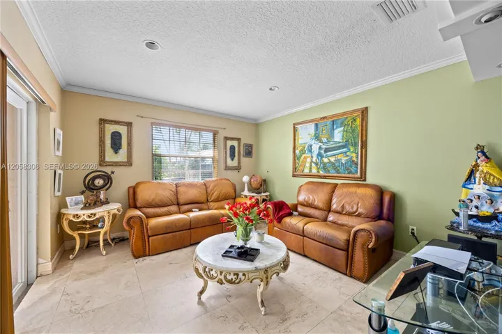 Family room exists to the pool area.