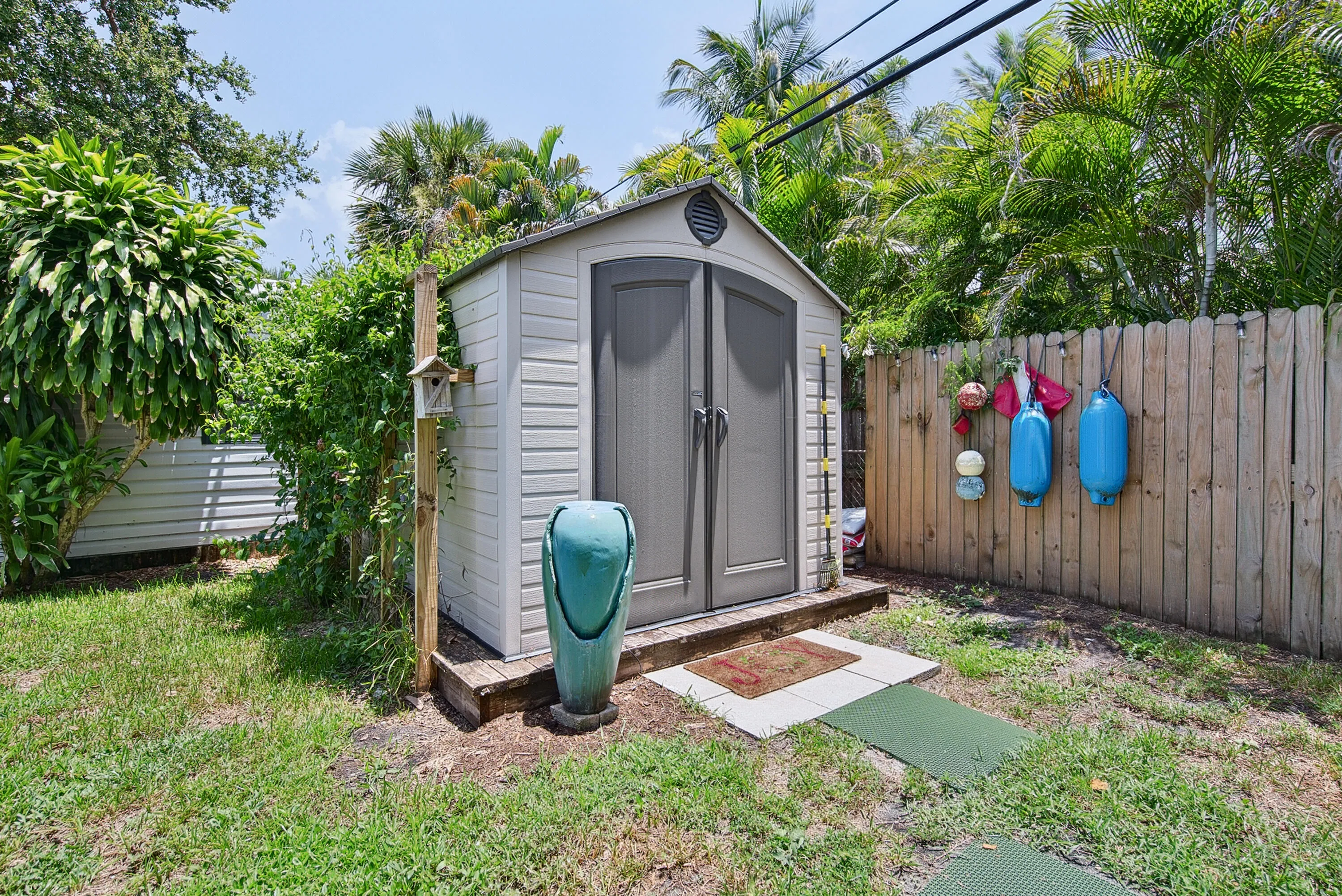 Spacious additional backyard shed/workshop/storage with door closed