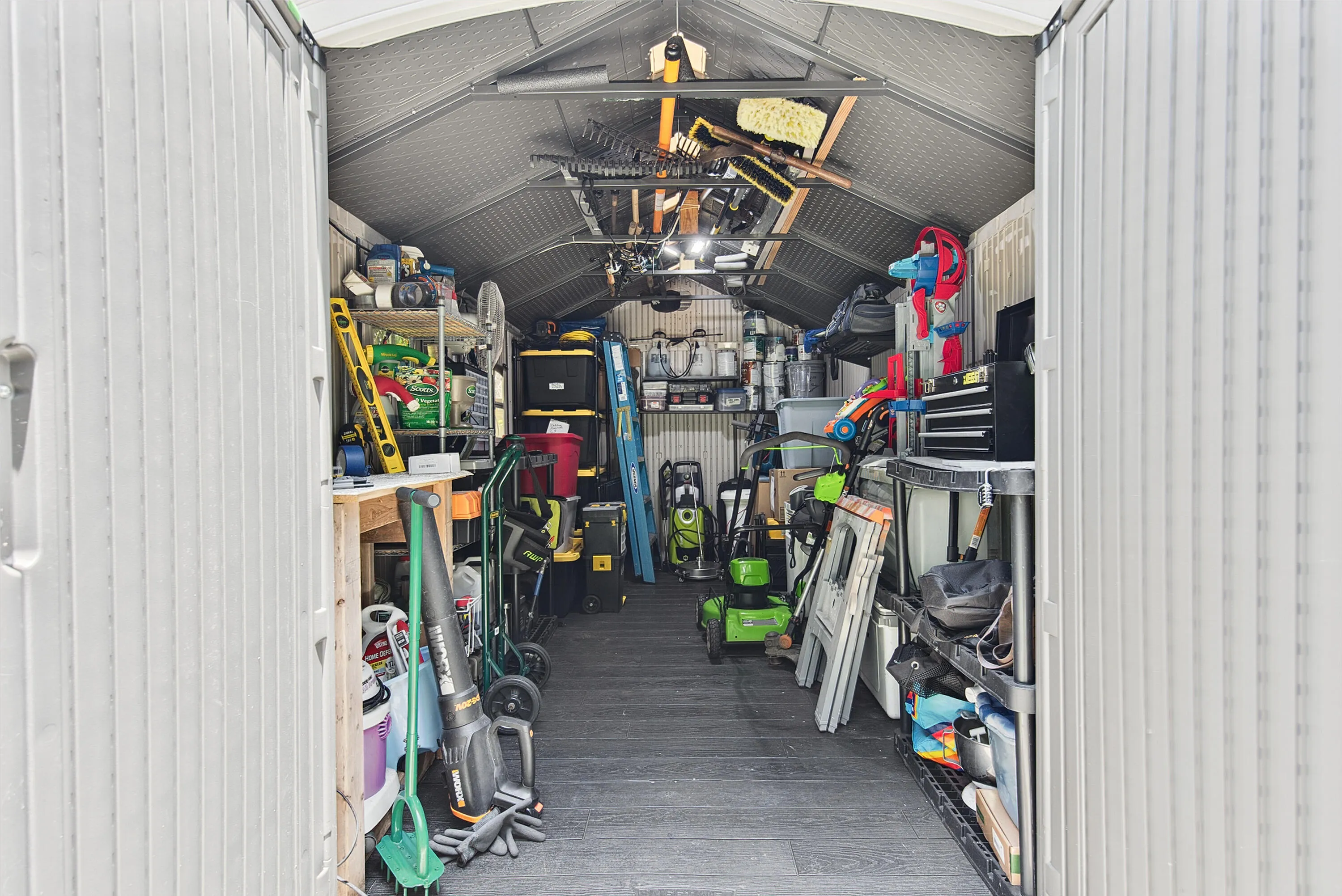 Spacious additional backyard shed/workshop/storage with door open