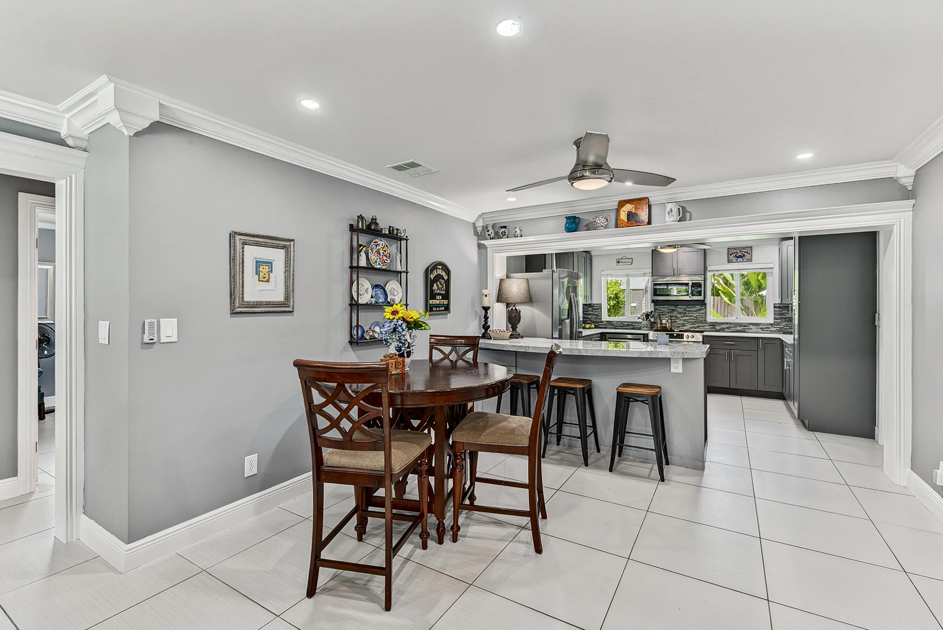Dining room with a view into the kitchen