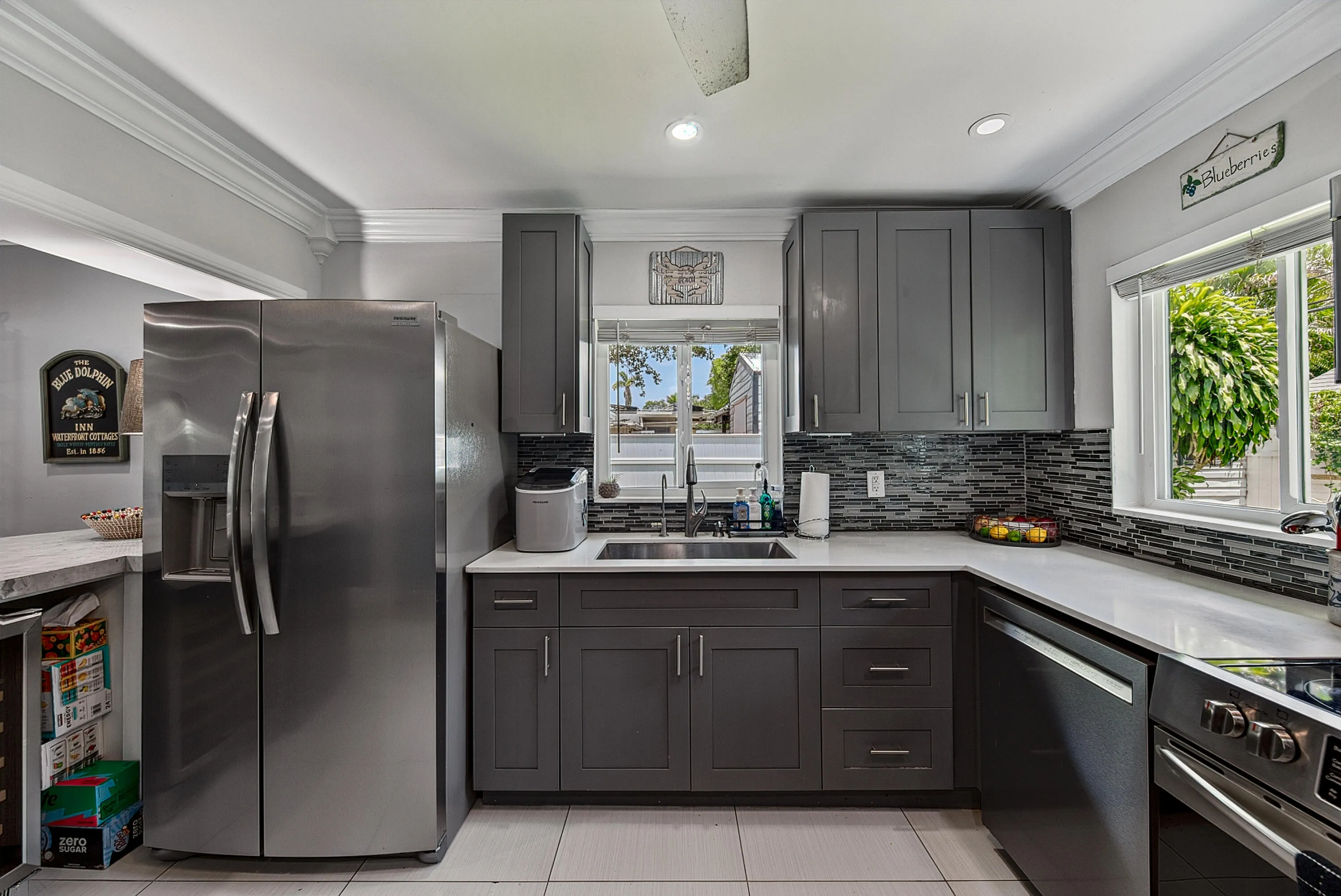 Kitchen with stainlees appliances and quartz counter