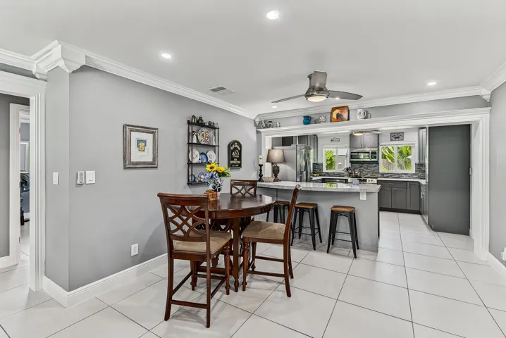 Dining room with a view into the kitchen