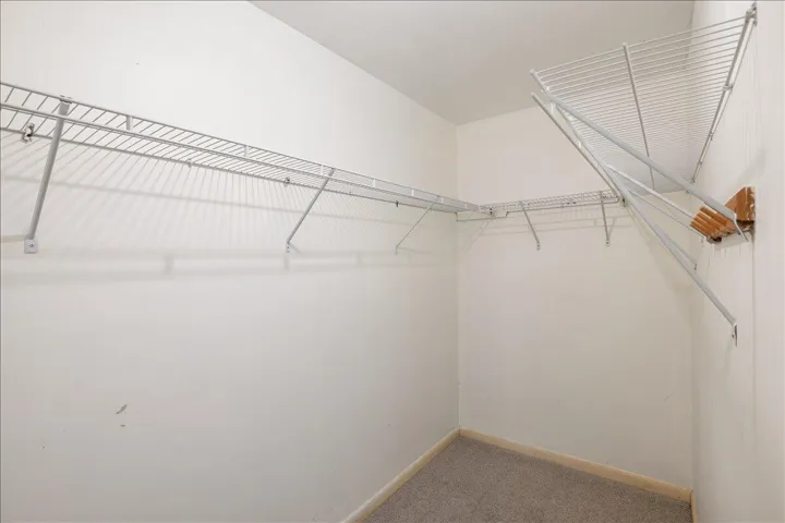 Primary walk- in closet