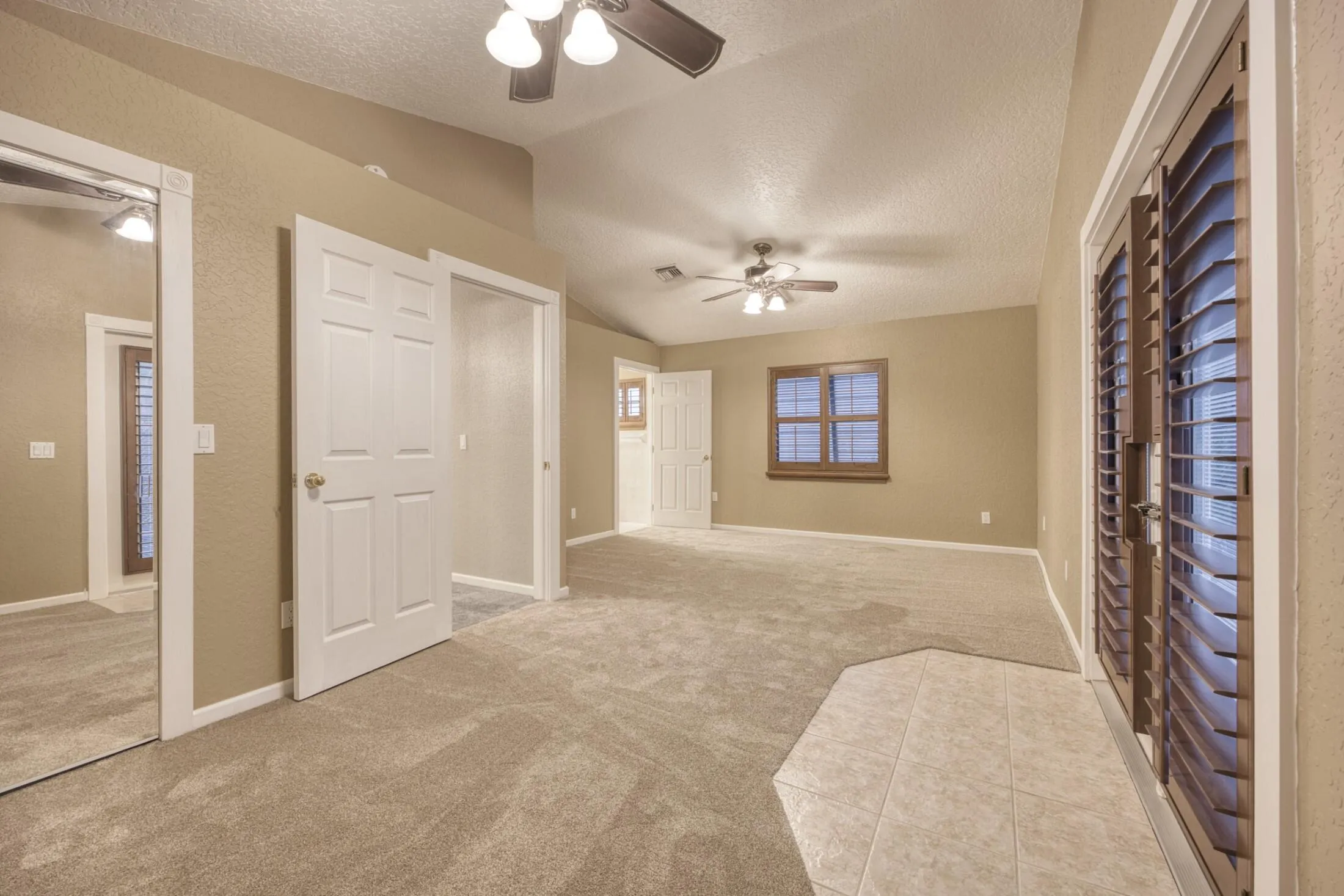 MASTER BEDROOM TO HALL WAY AND MASTER BATH