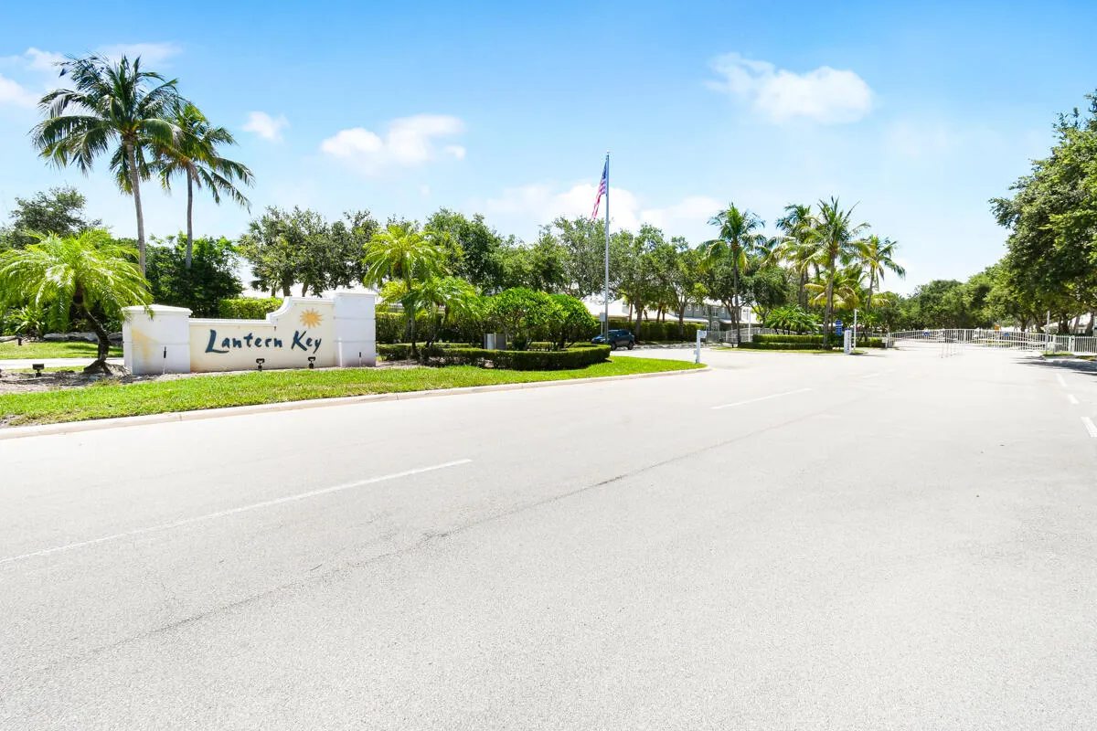Lantern Key community entrance with a decorative monument sign
