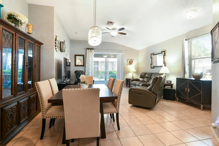 Tiled flooring extends through this open-concept living and dining area