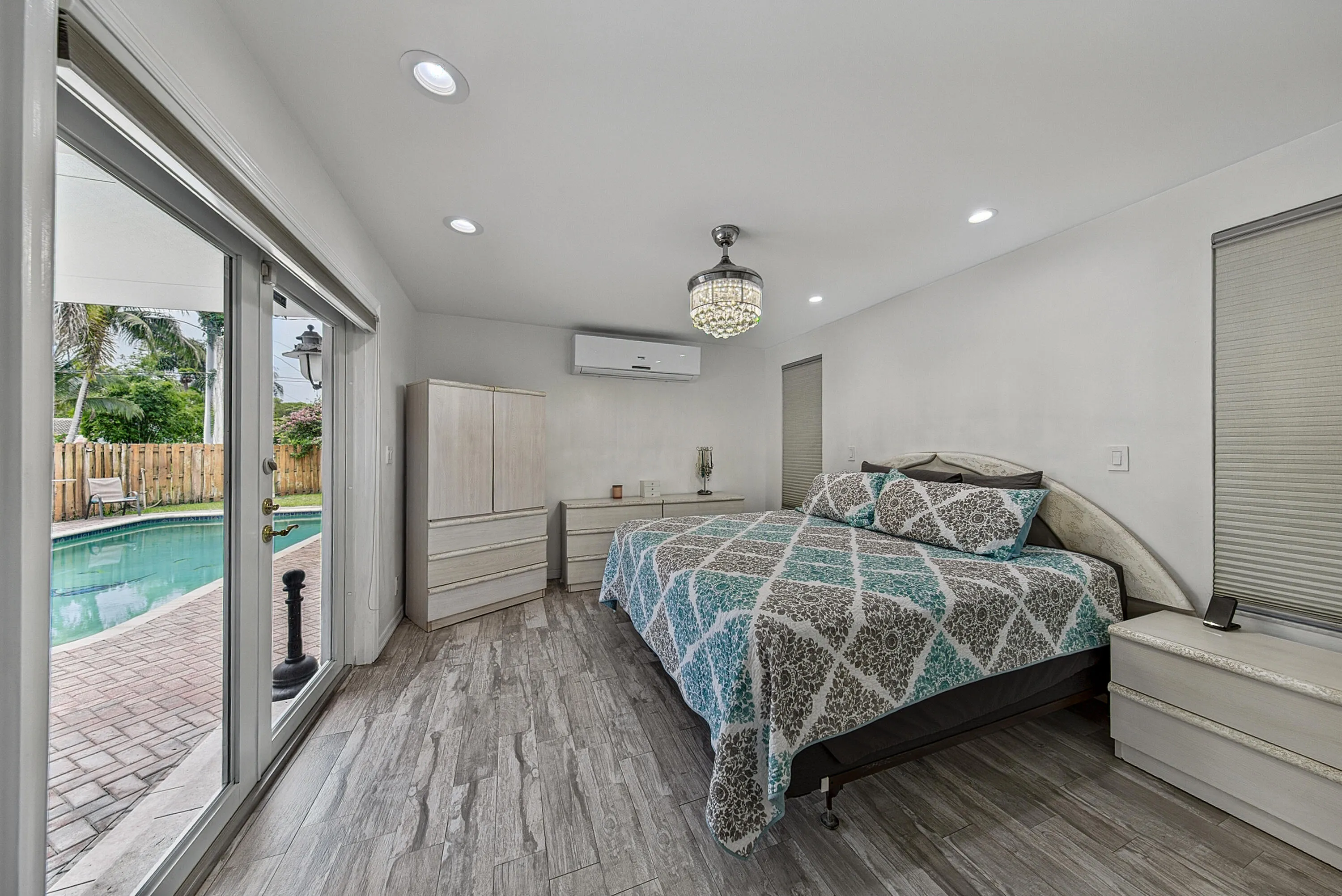 Primary Bedroom w/French Doors to Pool