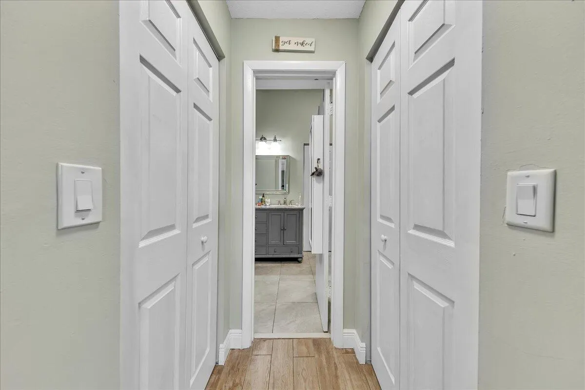 HIS AND HERS WALK IN CLOSETS