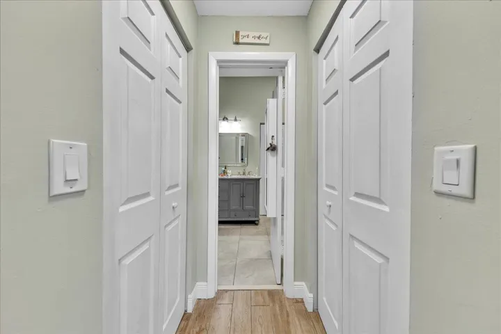 HIS AND HERS WALK IN CLOSETS