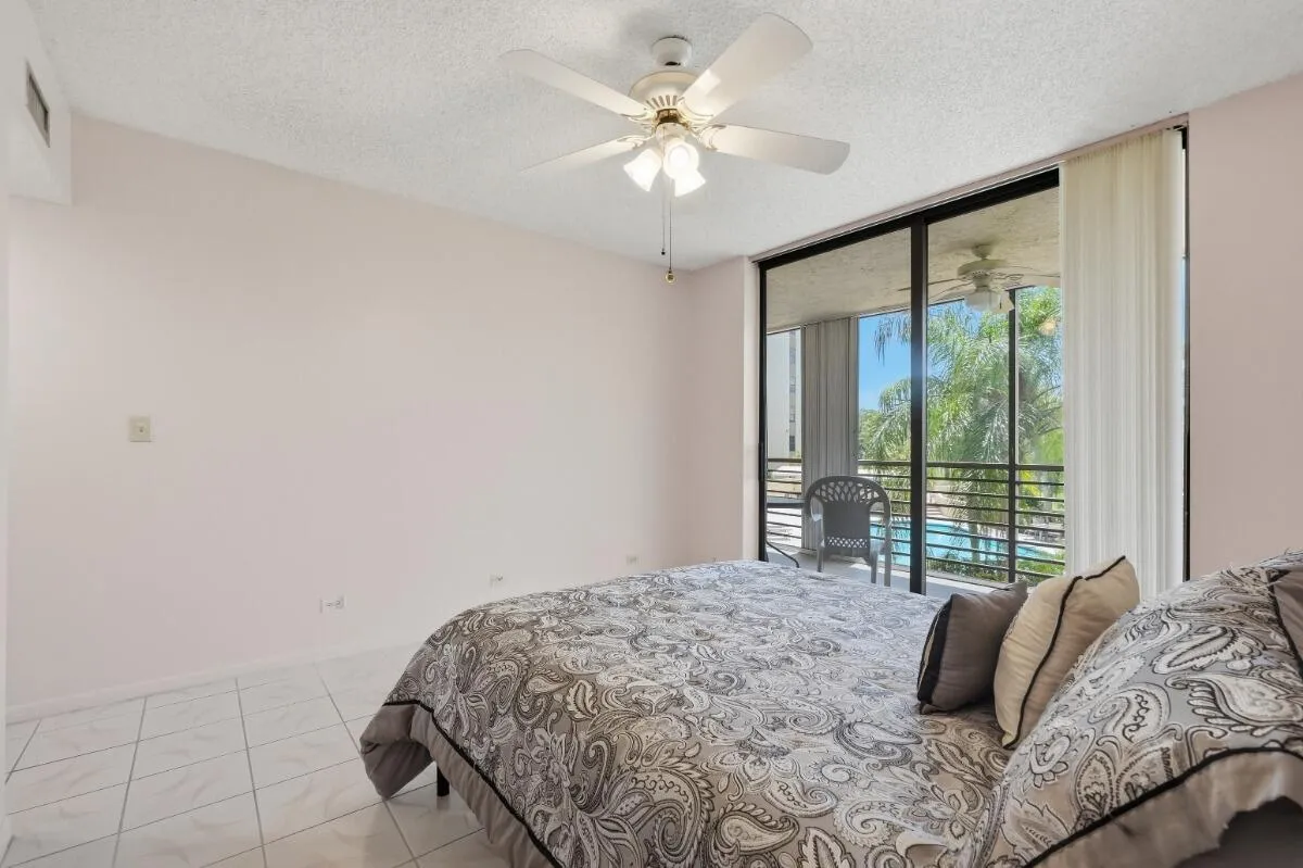 2nd Bedroom with access to Balcony and Pool View